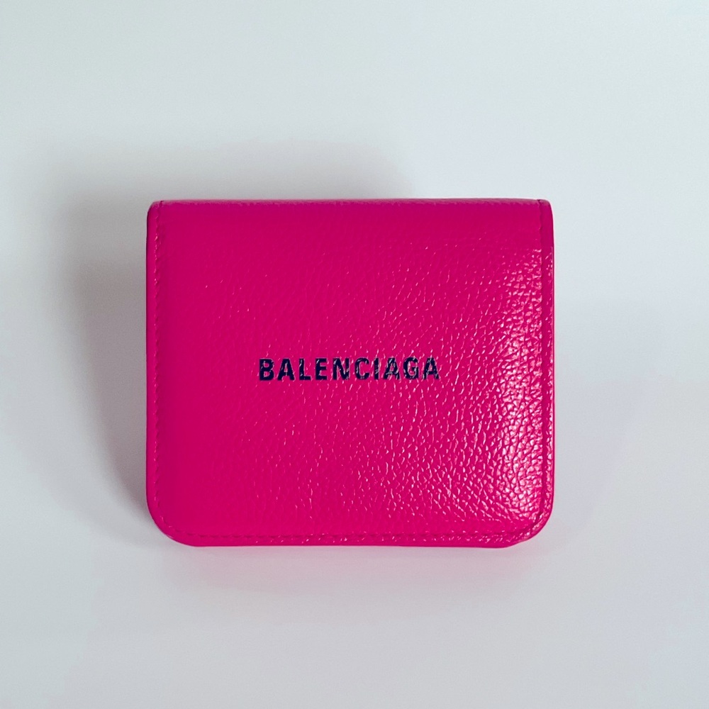 Authentic Balenciaga women’s pink bifold Snap Wallet.